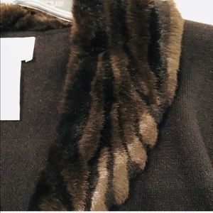 Black sweater with soft faux fur.